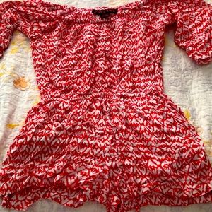 red and white pattern romper
